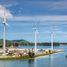 Wind turbines producing clean electricity in Victoria harbor, Mahe Island, Seychelles, byvalet