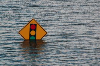 Flooding in Davenport Ohio. Photo by Kelly Sikkema on Unsplash