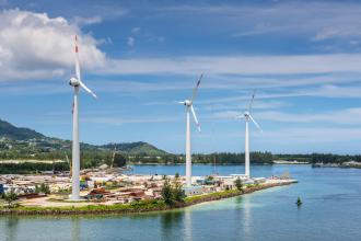 Wind turbines producing clean electricity in Victoria harbor, Mahe Island, Seychelles, byvalet